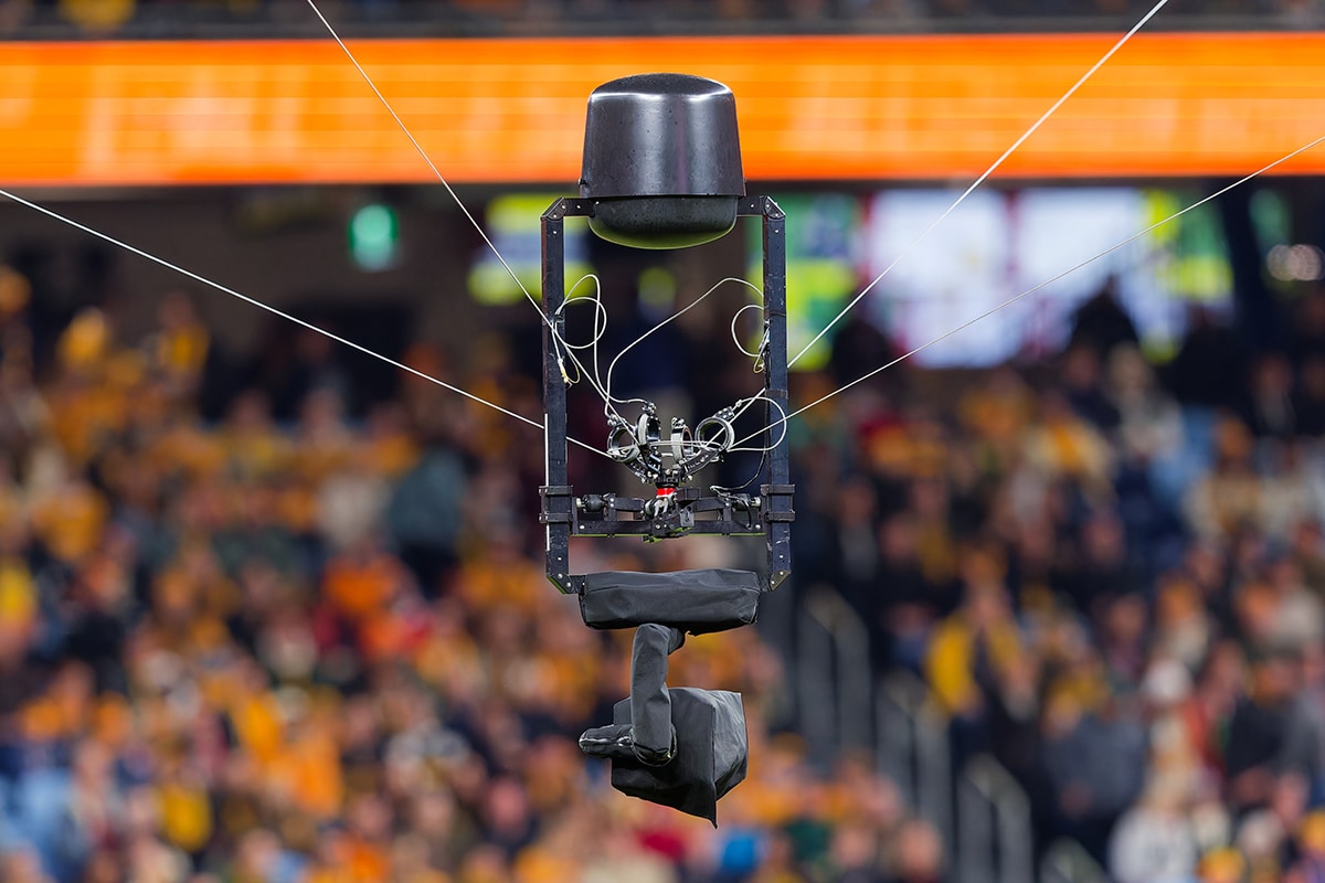 layout builder page a,spider,cam,camera,suspended,by,wires,in,action,during